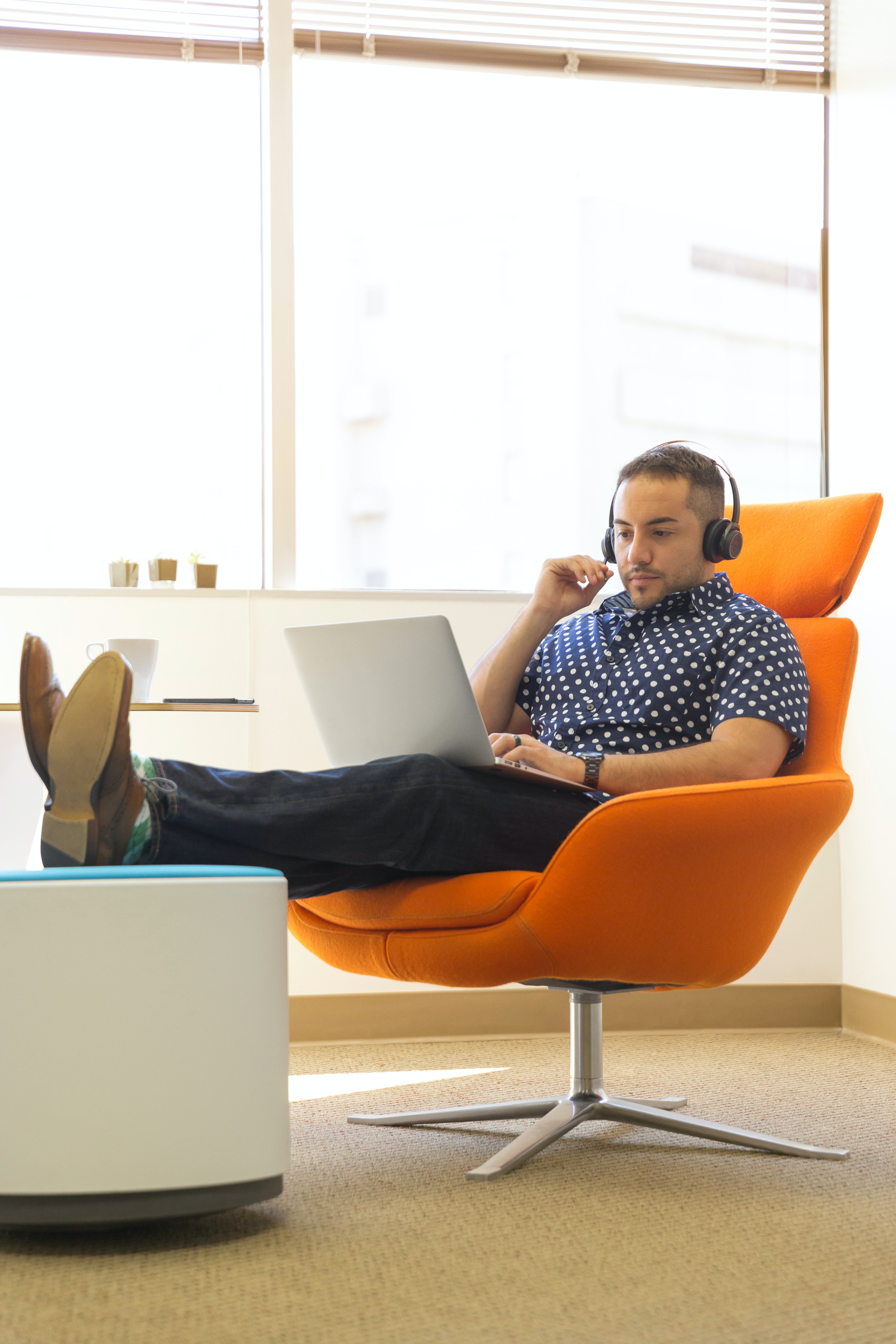 Businessman using Wheelchair in Office